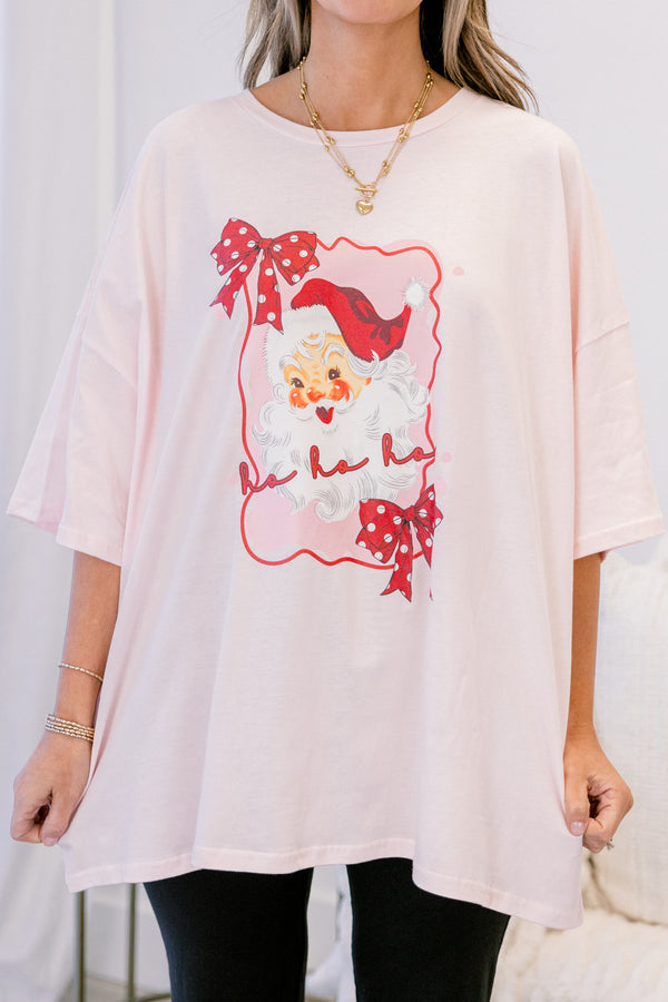 Chic Soul plus size clothing, cream short sleeve graphic tee with a Santa graphic on the center of the shirt that is surrounded  by a wavy bordered that has red polka dot bows on the edges