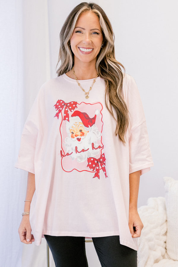 Chic Soul plus size clothing, cream short sleeve graphic tee with a Santa graphic on the center of the shirt that is surrounded  by a wavy bordered that has red polka dot bows on the edges