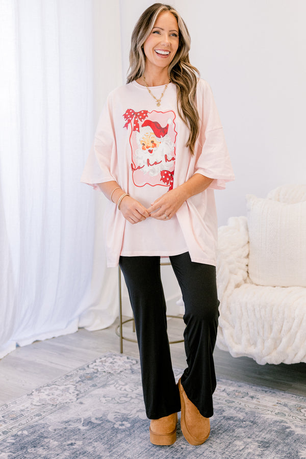 Chic Soul plus size clothing, cream short sleeve graphic tee with a Santa graphic on the center of the shirt that is surrounded  by a wavy bordered that has red polka dot bows on the edges
