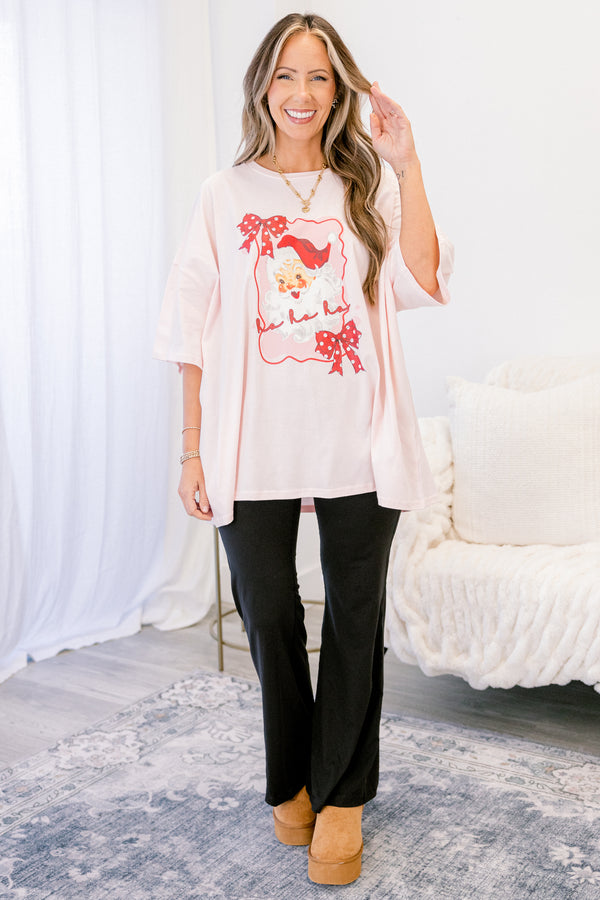 Chic Soul plus size clothing, cream short sleeve graphic tee with a Santa graphic on the center of the shirt that is surrounded  by a wavy bordered that has red polka dot bows on the edges