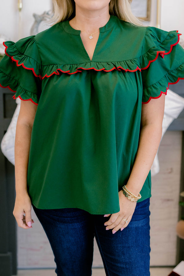 Chic Soul plus size clothing, dark green short flutter sleeve top with red scalloped trim along layered flutter sleeve