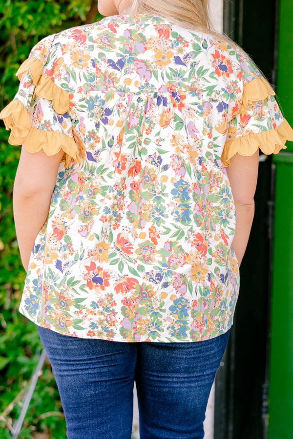 Chic Soul plus size clothing, white and multi colored floral print short sleeve top with orange scallop trim on sleeves