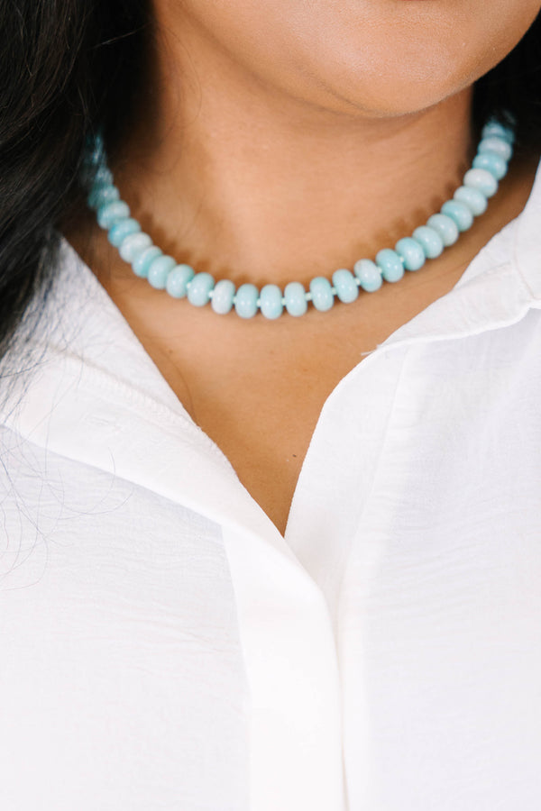 Plus Size seafoam green beaded necklace with rounded stones and a gold-toned clasp.