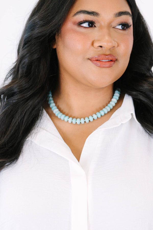 Plus Size seafoam green beaded necklace with rounded stones and a gold-toned clasp.