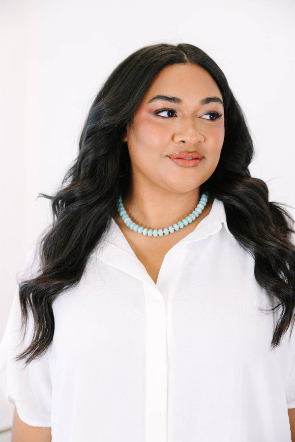 Plus Size seafoam green beaded necklace with rounded stones and a gold-toned clasp.