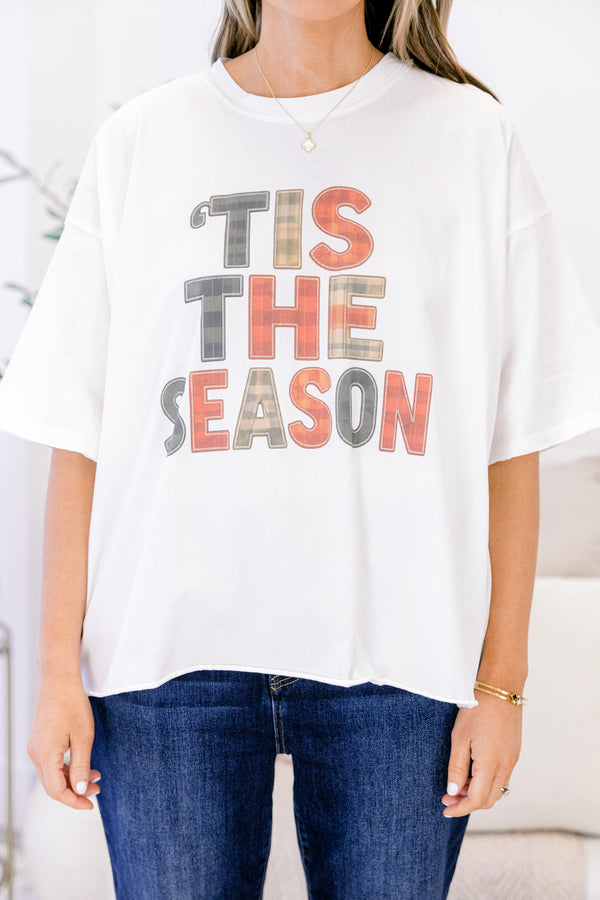 Chic Soul plus size clothing, white short sleeve slightly cropped vintage wash tee with “‘Tis The Season” in red blue and white plaid text on the front