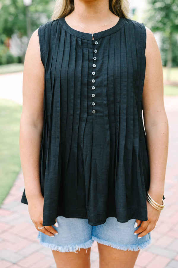 Plus Size black sleeveless top with vertical pleats, a button-down front, and a round neckline.