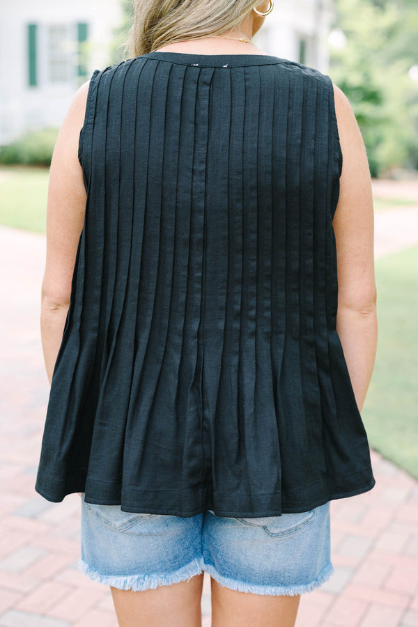 Plus Size black sleeveless top with vertical pleats, a button-down front, and a round neckline.
