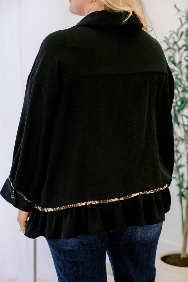 Chic Soul plus size clothing, black long sleeve top with a flare at the bottom as well as leopard stitching details at the bottom of each sleeve going down the center of the shirt and on the bottom of the shirt 
