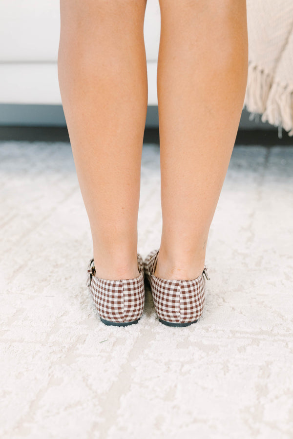 Brown gingham Mary Jane flats with a buckle strap