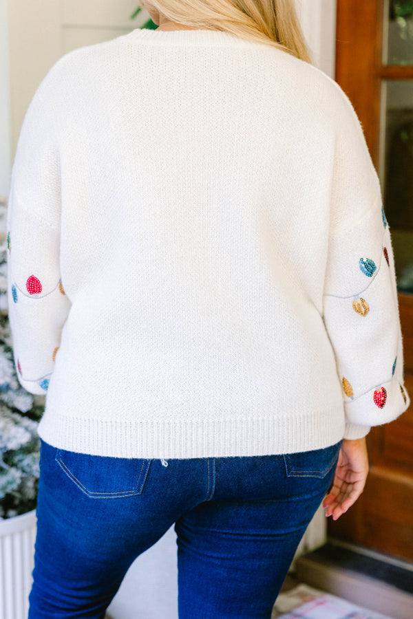 Chic Soul plus size clothing, cream knit sweater with a string of Christmas lights across the chest and sleeves
