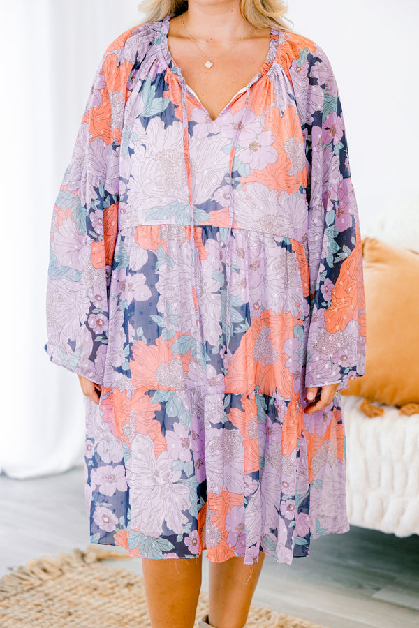 Chic Soul plus size clothing, flowy long-sleeve navy ruffled baby doll dress with a tied-scoop-neckline and a purple floral pattern 
