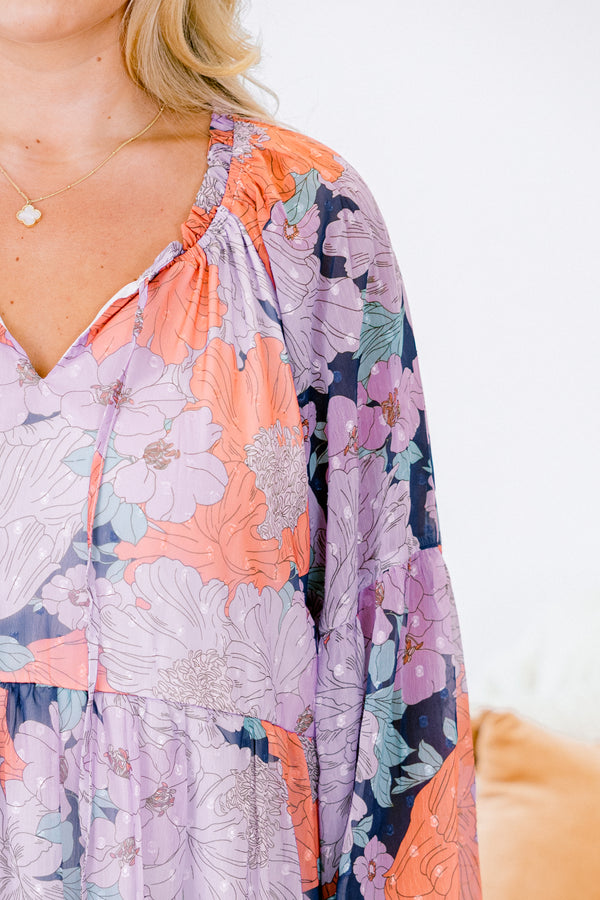 Chic Soul plus size clothing, flowy long-sleeve navy ruffled baby doll dress with a tied-scoop-neckline and a purple floral pattern 