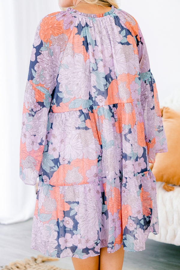 Chic Soul plus size clothing, flowy long-sleeve navy ruffled baby doll dress with a tied-scoop-neckline and a purple floral pattern 