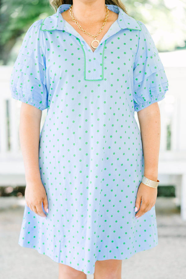 Plus Size light blue shift dress with green polka dots, tiered short sleeves, and a collared V-neck.