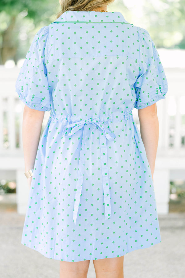 Plus Size light blue shift dress with green polka dots, tiered short sleeves, and a collared V-neck.