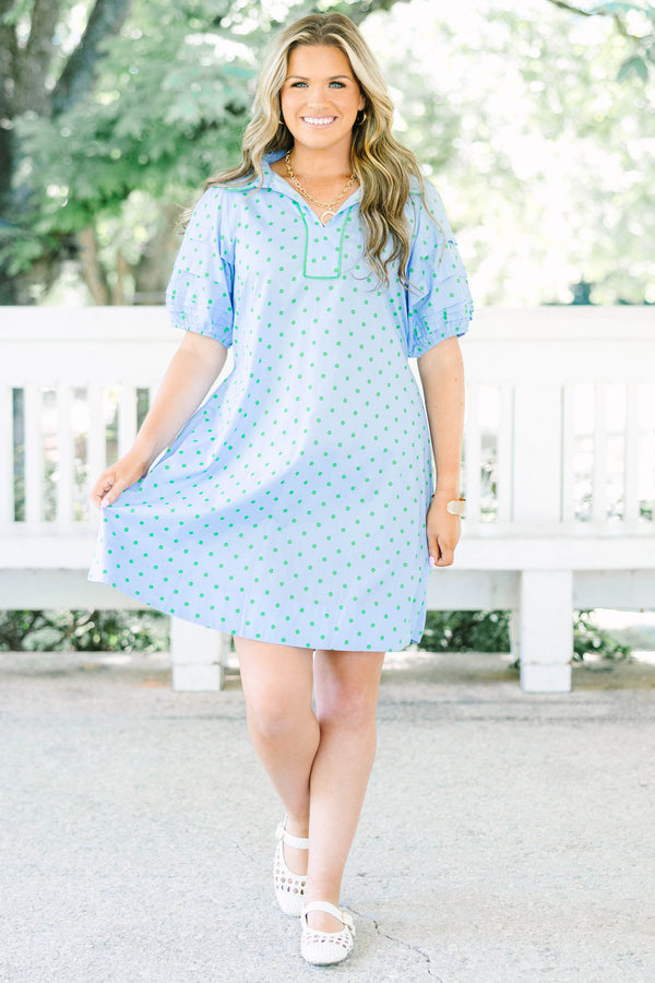 Plus Size light blue shift dress with green polka dots, tiered short sleeves, and a collared V-neck.