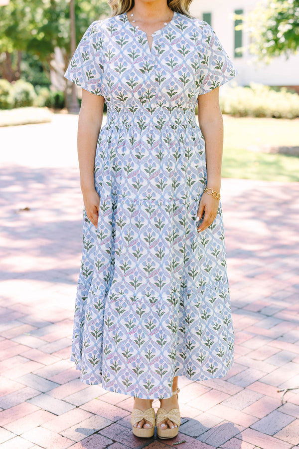 Plus Size blue and white floral print midi dress with short sleeves and a tiered skirt.
