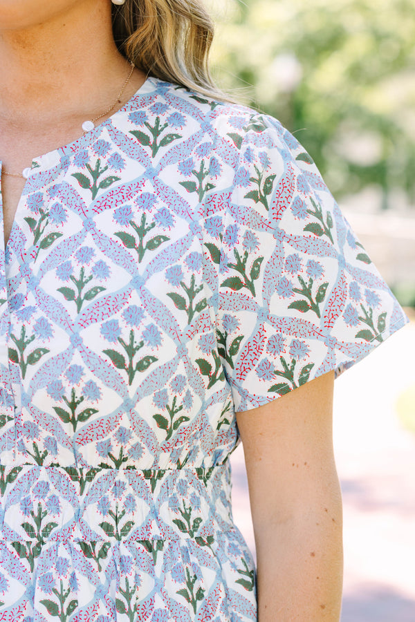 Plus Size blue and white floral print midi dress with short sleeves and a tiered skirt.