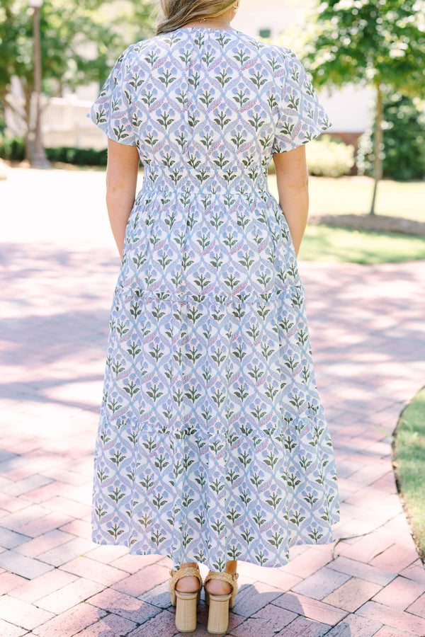 Plus Size blue and white floral print midi dress with short sleeves and a tiered skirt.