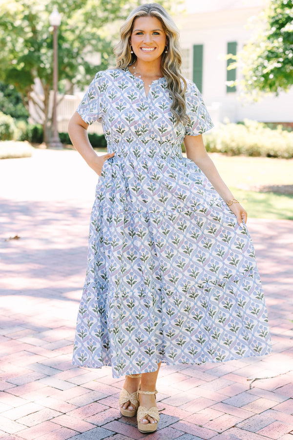 Plus Size blue and white floral print midi dress with short sleeves and a tiered skirt.