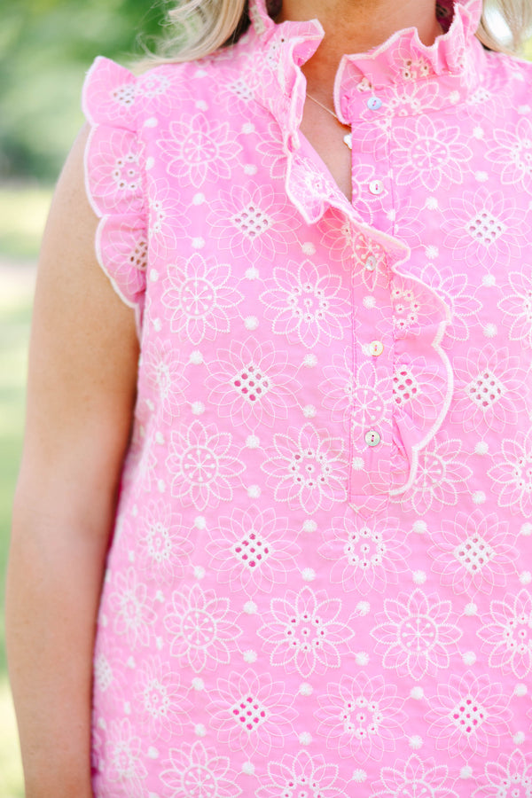 Plus Size pink eyelet sleeveless top with ruffled cap sleeves and a button-down mock neckline.