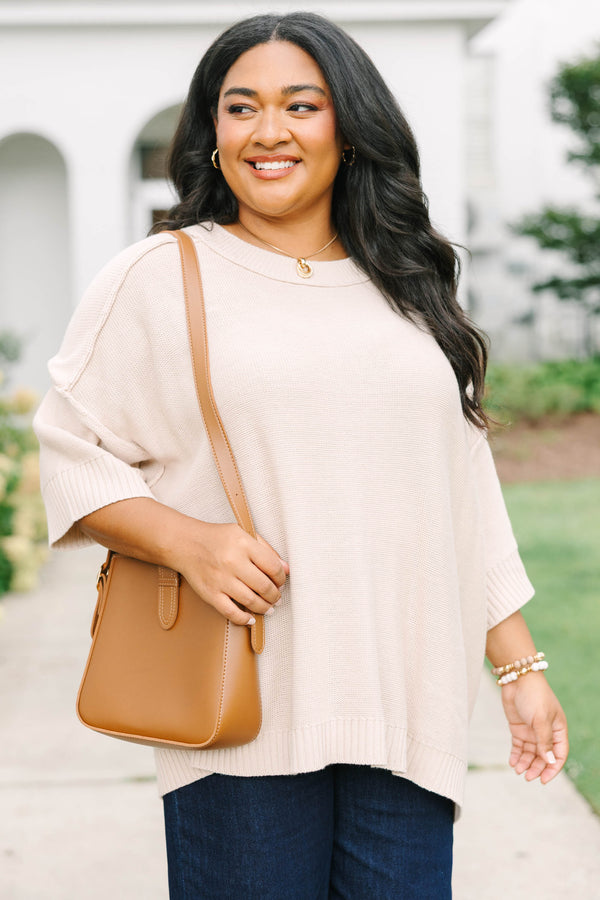 Plus size oatmeal oversized knit sweater with a flowy fit and short sleeves.