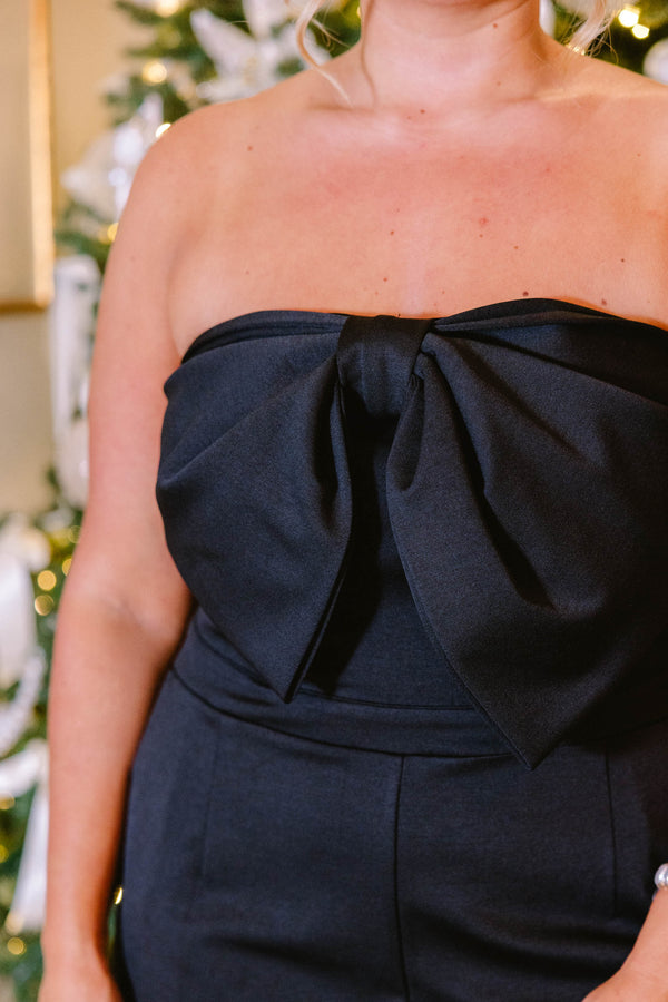 Chic Soul plus size clothing, black strapless jumpsuit with a bow detail on the chest 