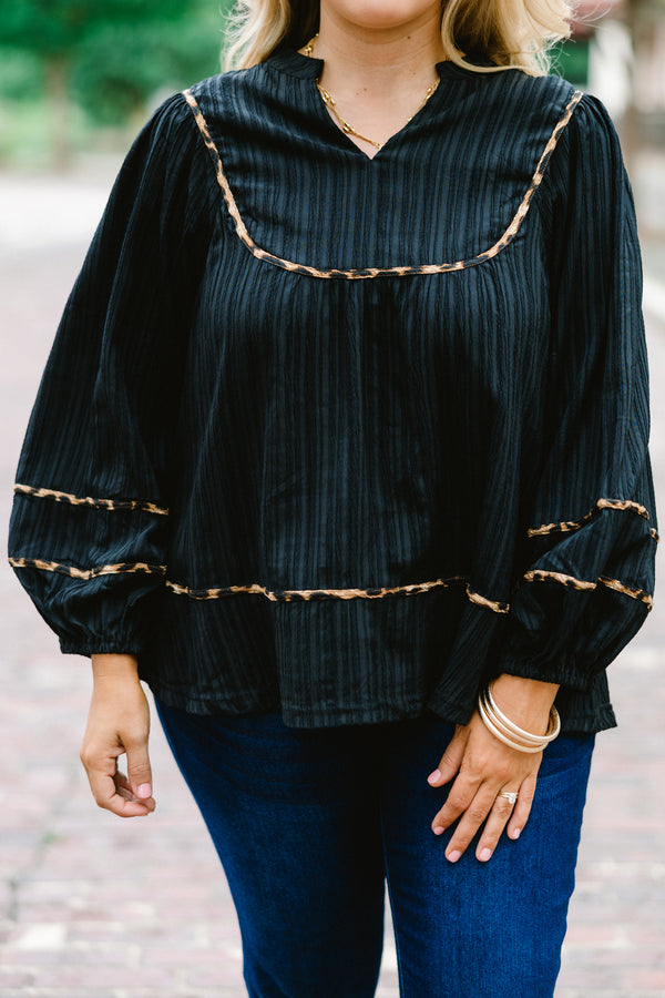 Chic Soul Plus size clothing, black long sleeve blouse with bubble that has cheetah stitching details on the sleeves bottom of the shirt and chest 