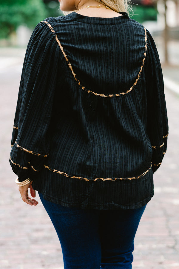 Chic Soul Plus size clothing, black long sleeve blouse with bubble that has cheetah stitching details on the sleeves bottom of the shirt and chest 
