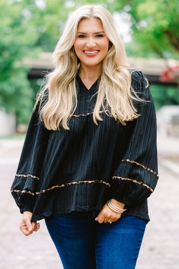 Chic Soul Plus size clothing, black long sleeve blouse with bubble that has cheetah stitching details on the sleeves bottom of the shirt and chest 