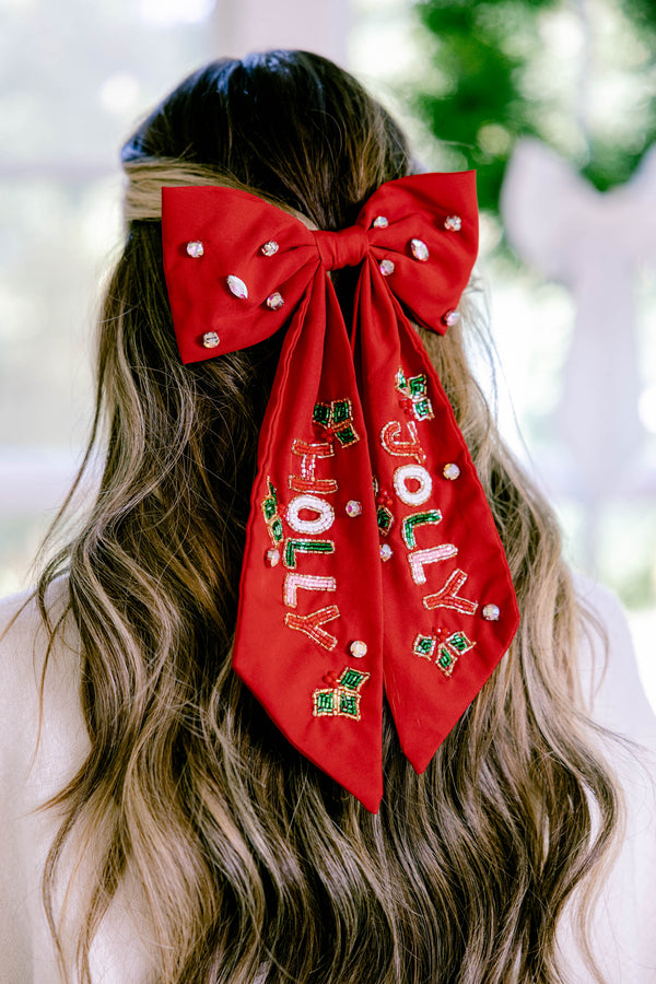 Chic Soul plus size clothing, red bow with diamond stone details throughout and on the right side of the bow the word 
