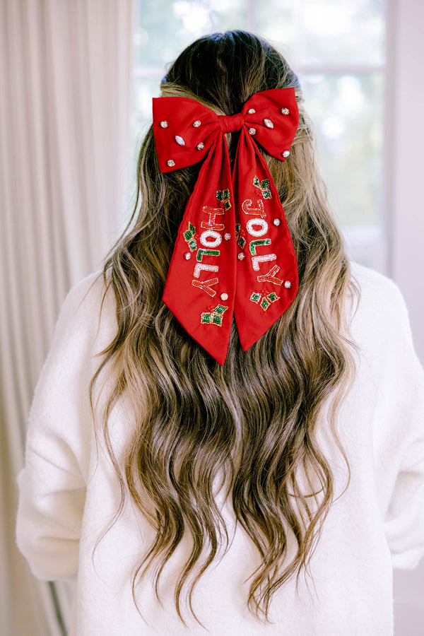 Chic Soul plus size clothing, red bow with diamond stone details throughout and on the right side of the bow the word 