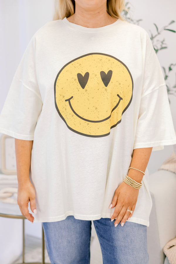 Chic Soul plus size clothing, ivory boyfriend tee with a yellow heart eyed smiley face graphic on the front