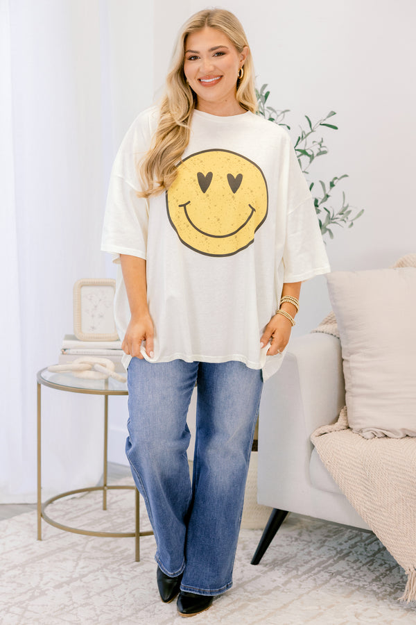 Chic Soul plus size clothing, ivory boyfriend tee with a yellow heart eyed smiley face graphic on the front