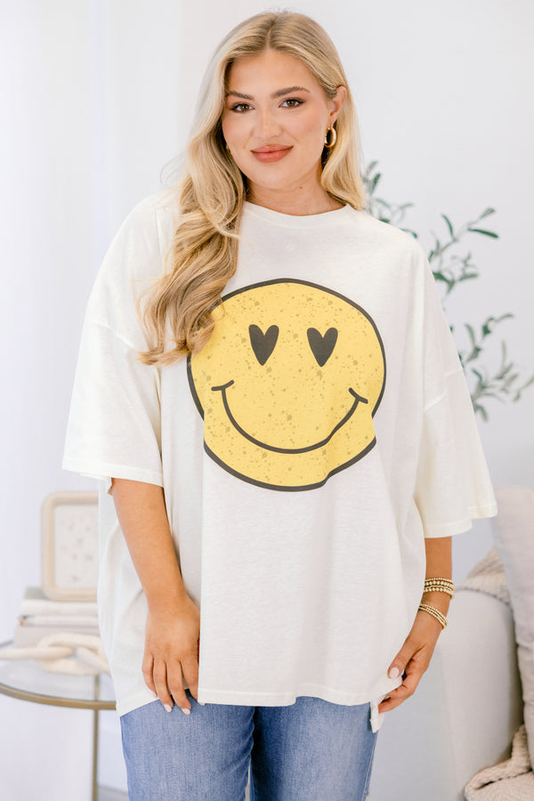 Chic Soul plus size clothing, ivory boyfriend tee with a yellow heart eyed smiley face graphic on the front