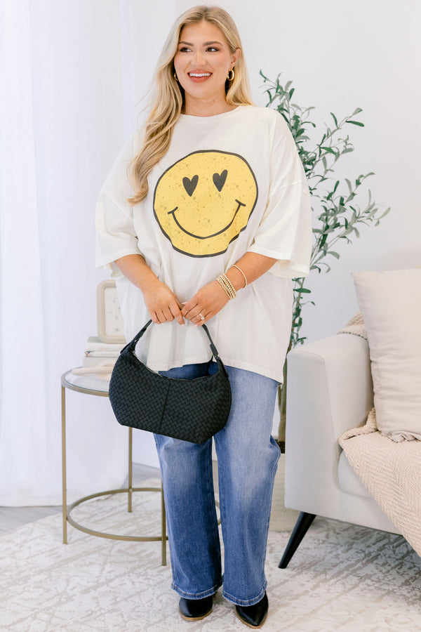 Chic Soul plus size clothing, ivory boyfriend tee with a yellow heart eyed smiley face graphic on the front