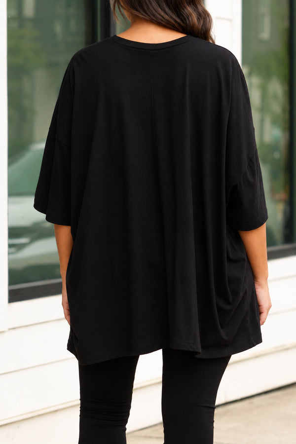 Chic Soul plus size clothing, black oversized tee with a leopard smiley graphic