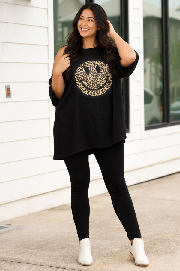 Chic Soul plus size clothing, black oversized tee with a leopard smiley graphic