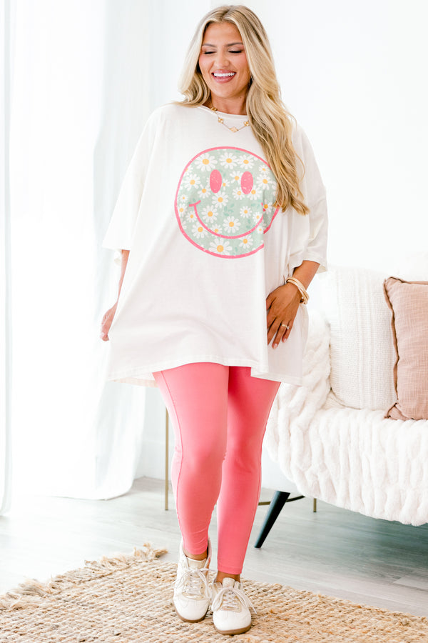 Chic Soul plus size clothing, ivory graphic tee with a pink smiley face on the center of the shirt that is filled with a blue daisy pattern 