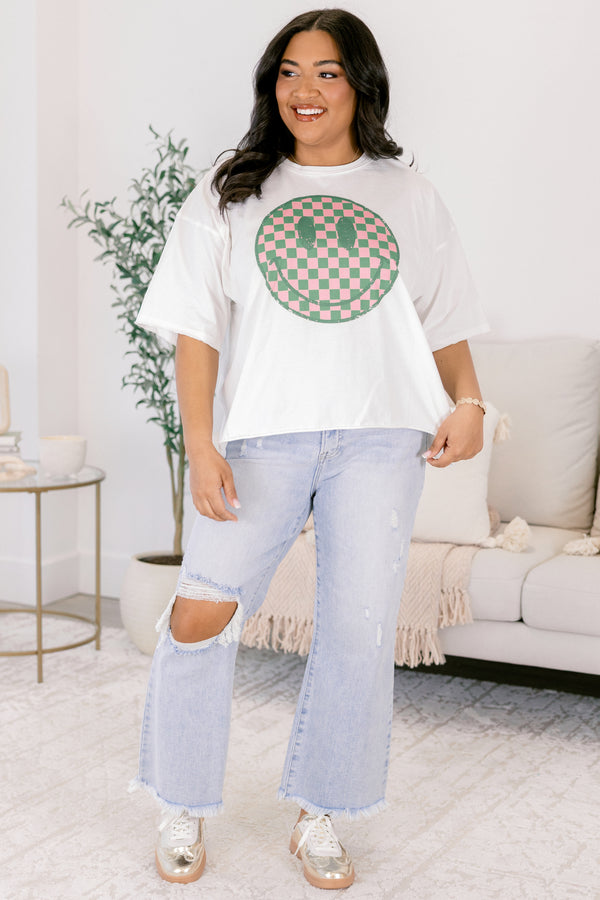 Chic Soul plus size clothing, white short sleeve graphic tee with a checkered pink and green smiley face on the center of the shirt 