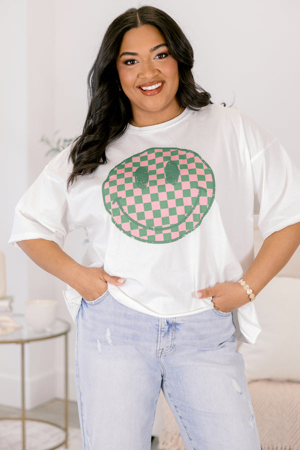 Chic Soul plus size clothing, white short sleeve graphic tee with a checkered pink and green smiley face on the center of the shirt 