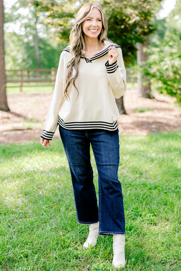 Chic Soul plus size clothing, off-white long sleeve hooded sweater with thin black stripes lining the hem, neckline, and sleeve
