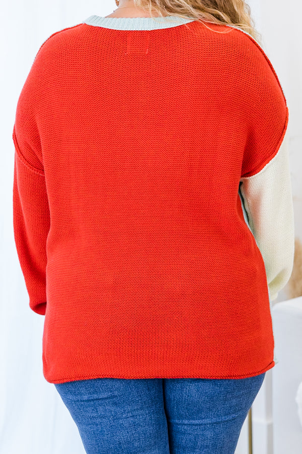 Chic Soul plus size clothing, long-sleeve knit blue sweater with one sleeve ivory and one sleeve rust orange with a scoop-neckline and inside-out stitching 
