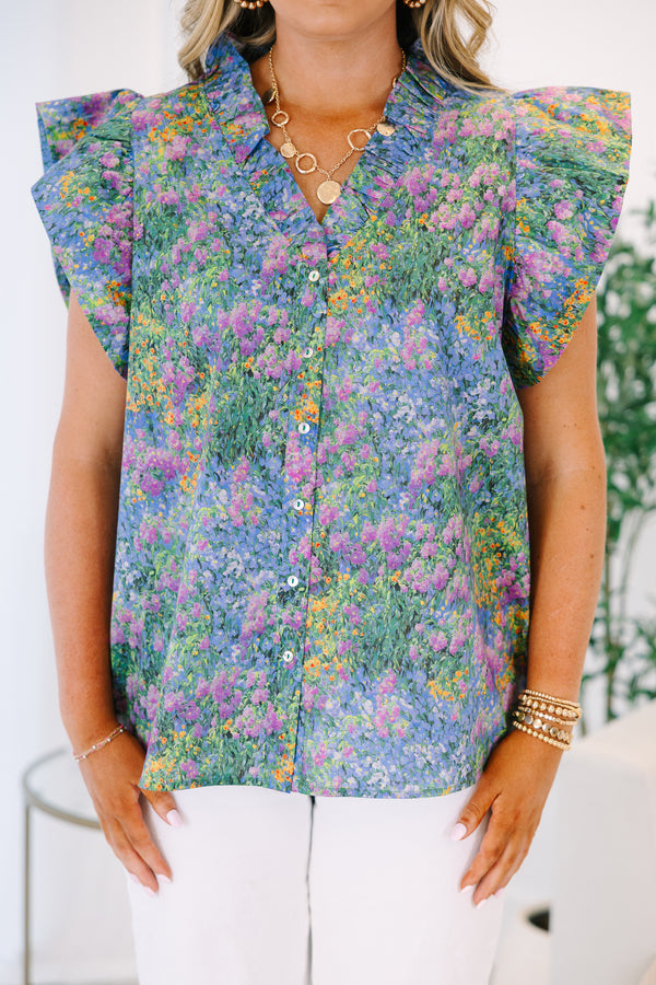 Plus Size purple multi floral button-down top with ruffled flutter sleeves and a V-neckline.