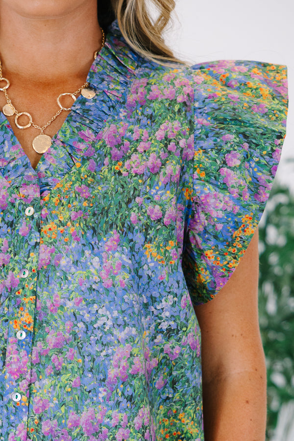 Plus Size purple multi floral button-down top with ruffled flutter sleeves and a V-neckline.