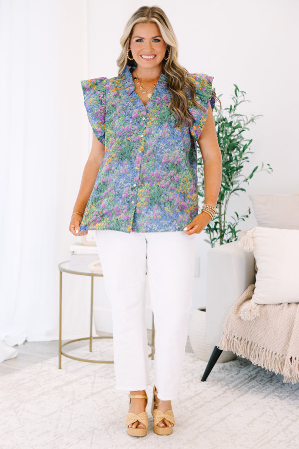 Plus Size purple multi floral button-down top with ruffled flutter sleeves and a V-neckline.