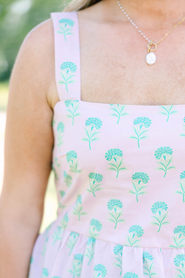 Plus Size pink babydoll top with a green floral print, square neckline, and wide straps.