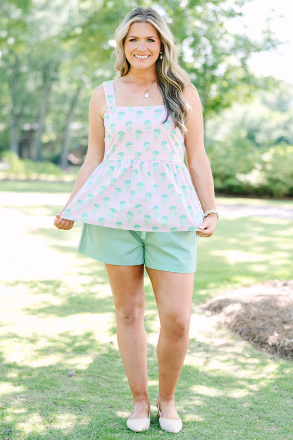 Plus Size pink babydoll top with a green floral print, square neckline, and wide straps.