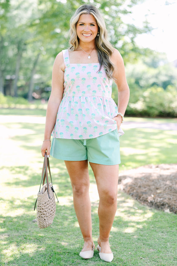Plus Size pink babydoll top with a green floral print, square neckline, and wide straps.